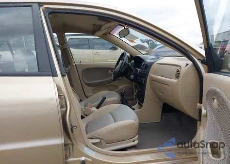 2001 Kia Rio z USA, uszkodzony, nr VIN KNADC123X16014652